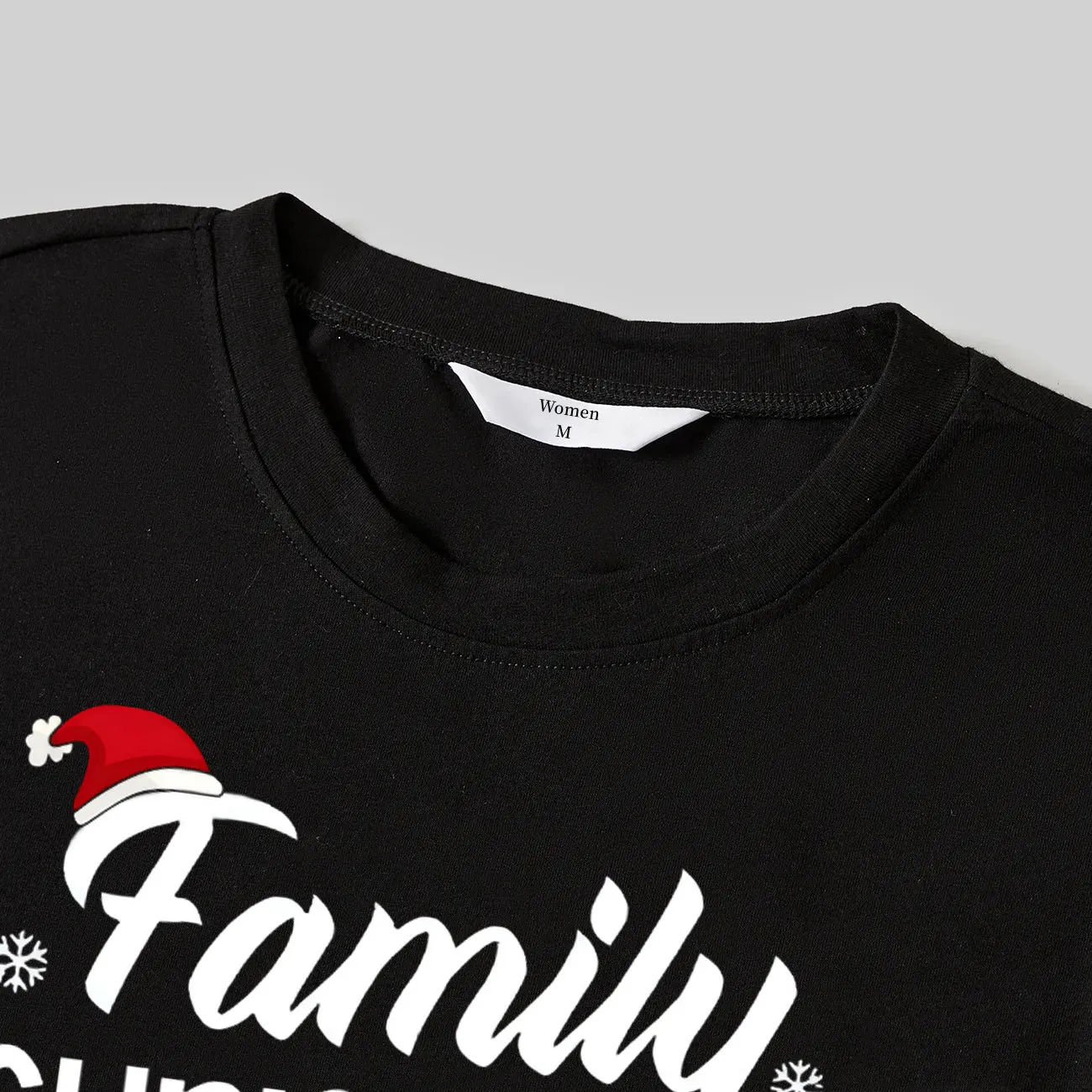 "Family Christmas 2024 Making Memories Together" Text and Santa Hat Printed Black and Green Plaid Family Christmas Matching Pajamas